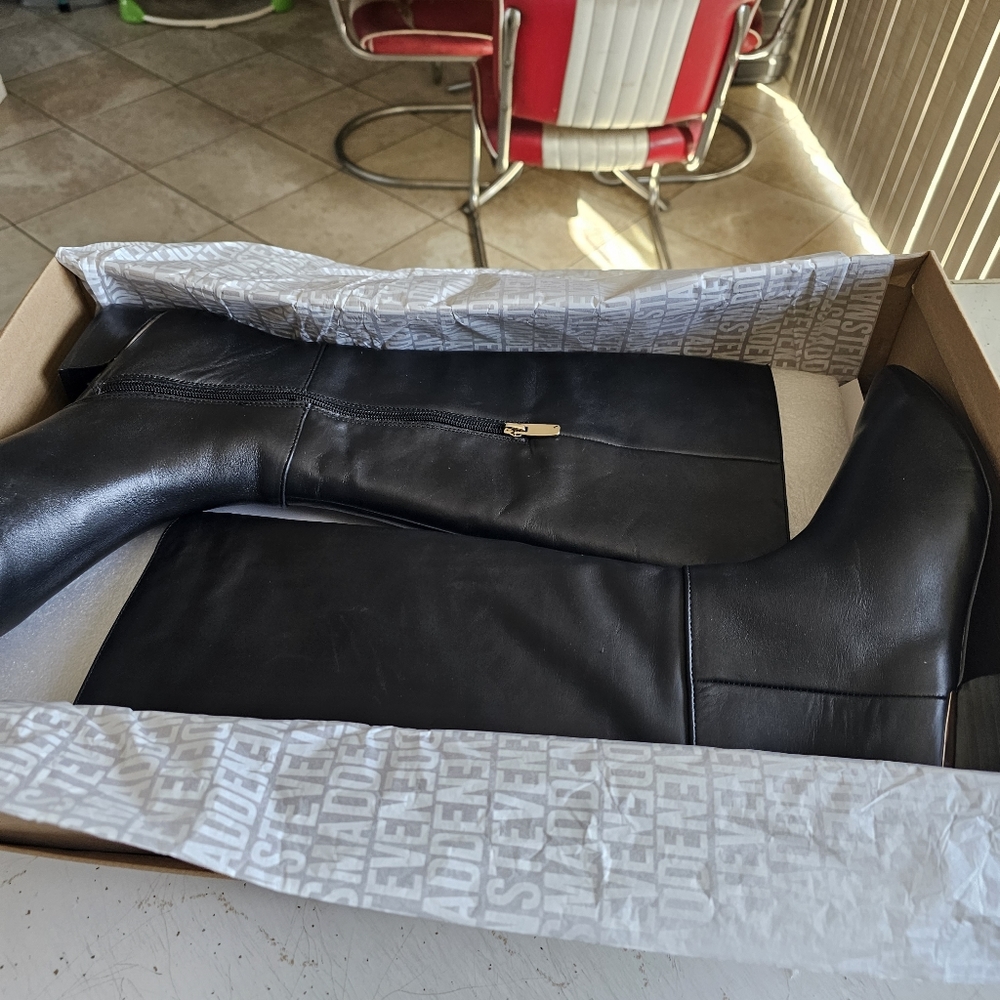 New In box black leather Steve Madden Boots size 10. Adelina black. Fit Smaller.